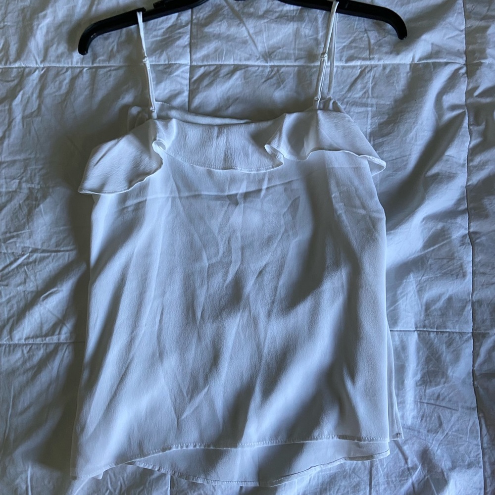 White H&M tank top with ruffled detailing